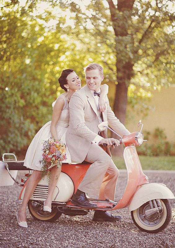 newlyweds in love......love the idea of a little scooter for wedding/engagement photos